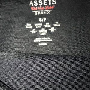 Two pair of assets by Spanx red hot label leggings